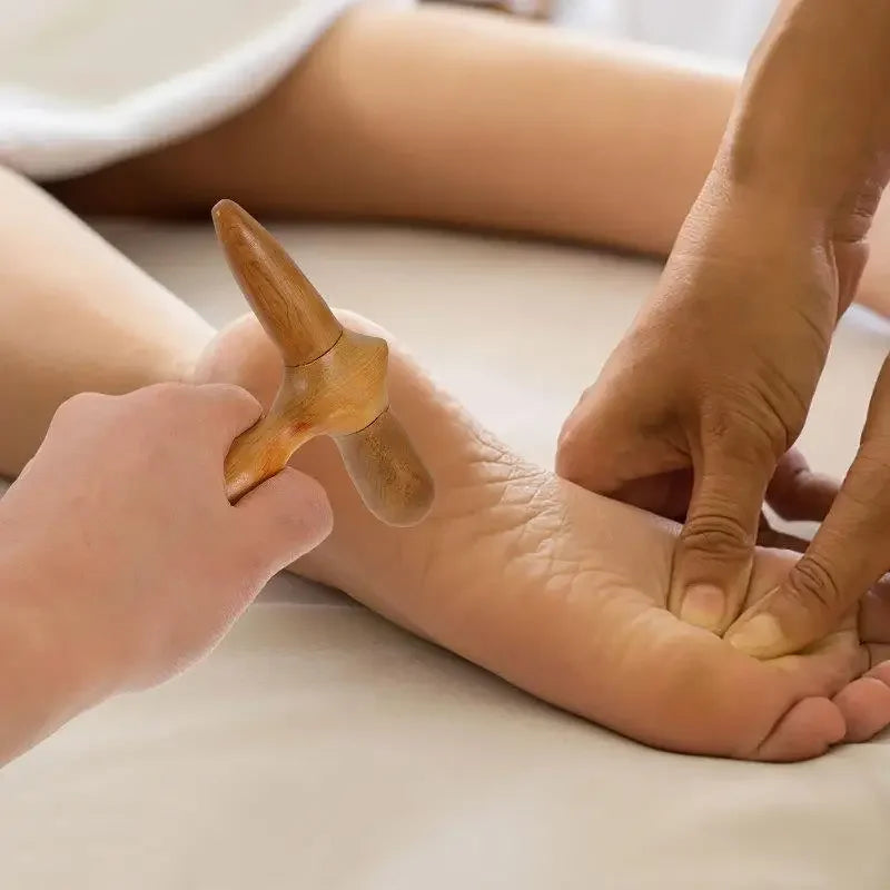 A wooden foot massage stick, muscle relief massage tool, ergonomic foot acupressure massager
